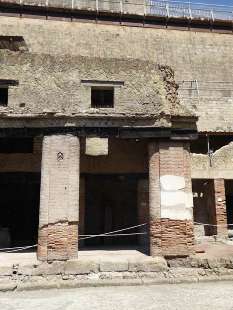 Decumanus Maximus, Herculaneum, July 2015. Building on north side of the Decumanus Maximus, doorway and upper floors, numbered 5. Photo courtesy of Michael Binns.
